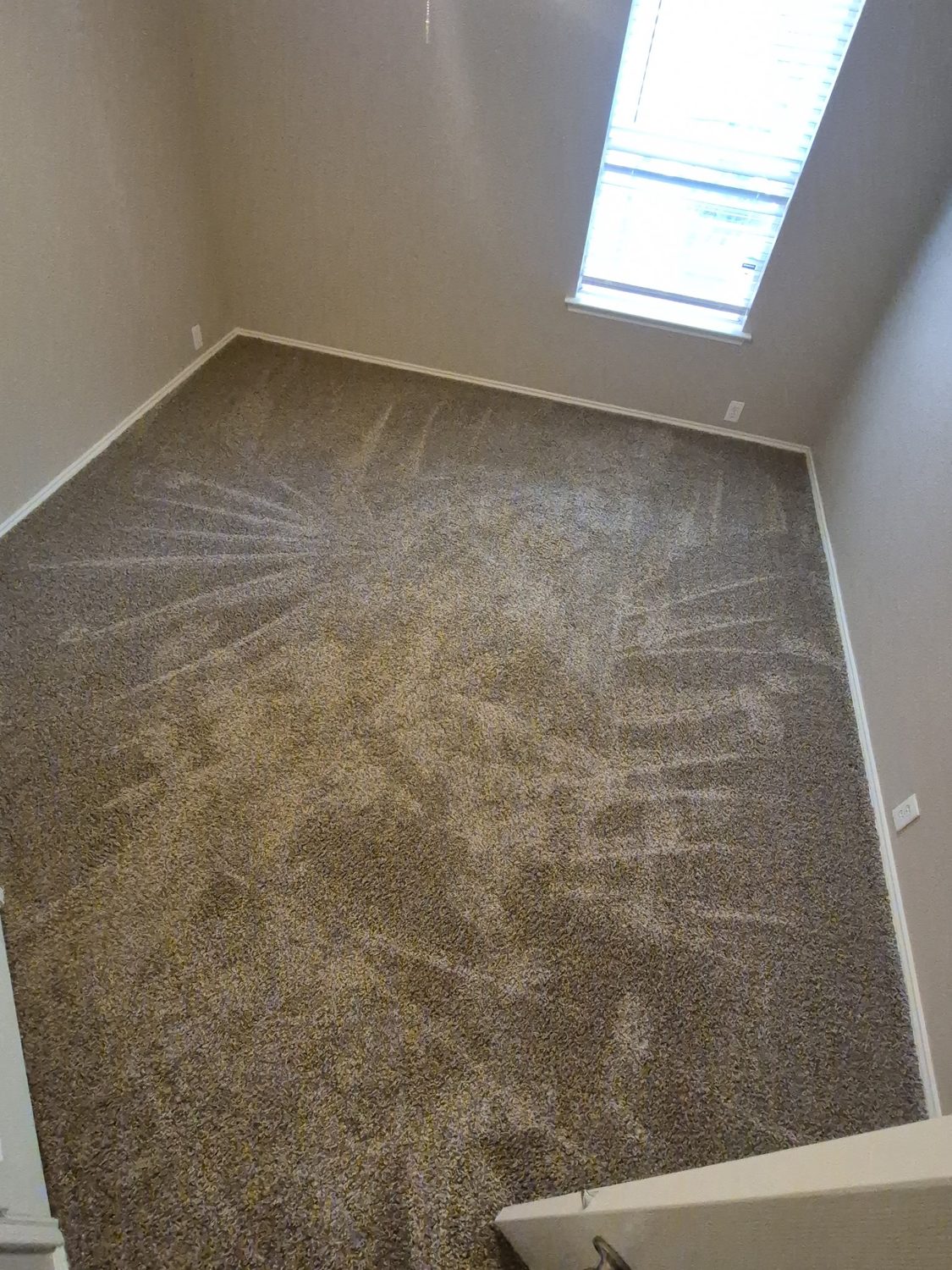 Bedroom with old worn carpet before